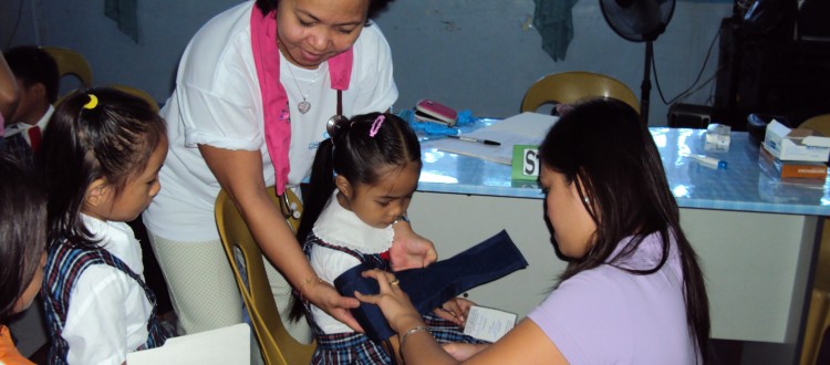 Beth Silver from Florida, USA joined with a local volunteer conduct a health fair in the Philippines