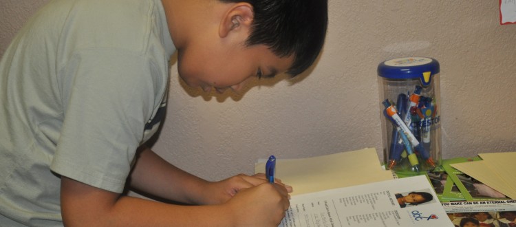 Dan Marlo Catangay from Florida, USA Signing a Commitment to Sponsor a child in the Philippines