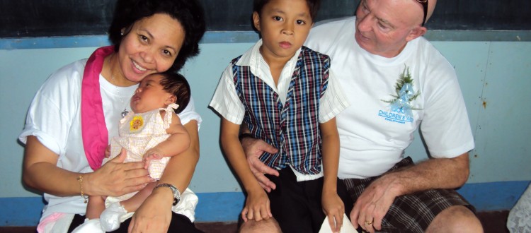 Irv and Beth Silver from Florida, USA visit their sponsored child in Bacolod School in the Philippines