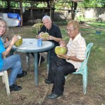 Steve & Annie enjoy buko (coconut) drink with Pr. Vic Oriel