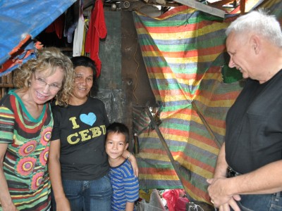 Steve and Annie Perron visit student's home during their mission trip to the Philippines